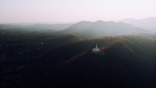 Scenic view of mountains against sky during sunset