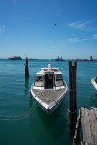 Boats moored in sea against sky at bintan island