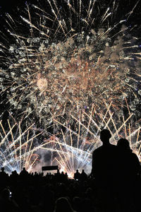 Firework display at night