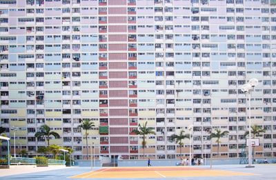 Building and basketball court in city