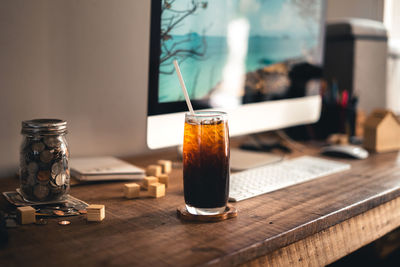 Close-up of drink in jar on table