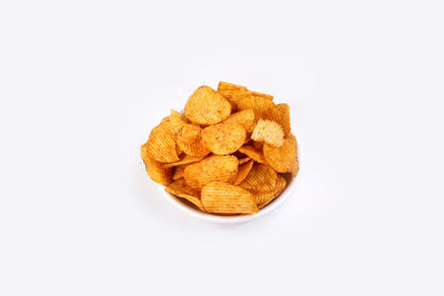 High angle view of bread in bowl against white background