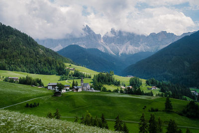 Scenic view of landscape and mountains against sky