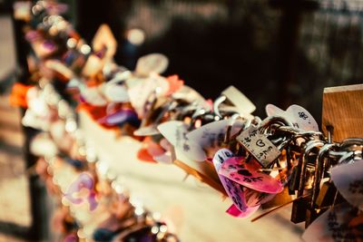 Close-up of padlocks hanging on metal