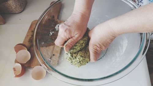 High angle view of person preparing food in kitchen