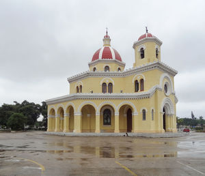 View of building against cloudy sky