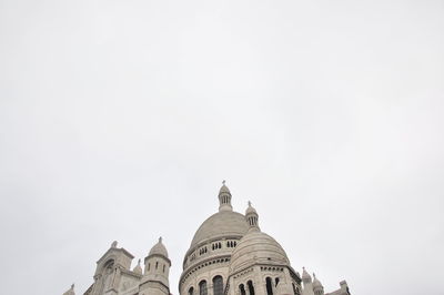 Low angle view of basilique du sacre coeur against clear sky