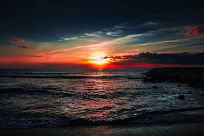 Scenic view of sea against sky during sunset