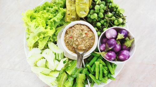 High angle view of chopped vegetables in bowl on table