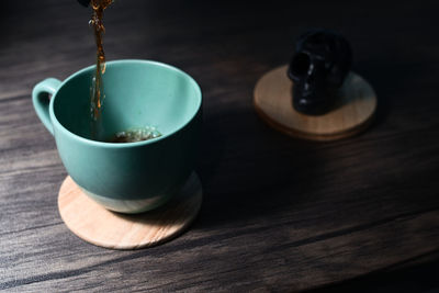 High angle view of tea cup on table