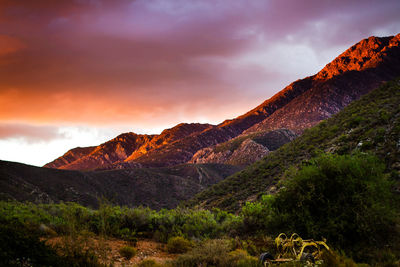 Scenic view of mountains against sky during sunset