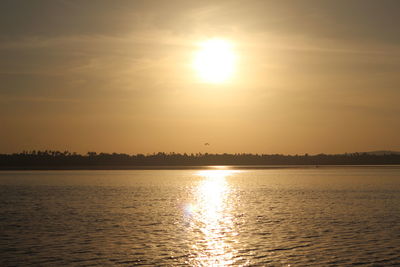 Scenic view of sea at sunset