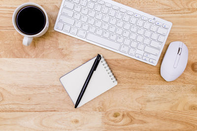 High angle view of coffee cup on table