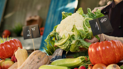 Midsection of man holding food