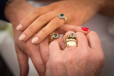 Cropped hand holding ring