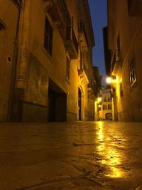 Buildings in city at night