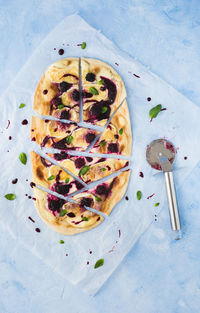 High angle view of pizza in plate on table