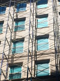 Low angle view of built structure against blue sky