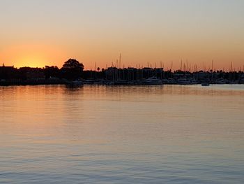 Silhouette of marina at sunset