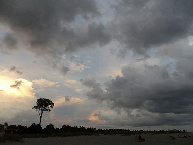 sky, cloud - sky, silhouette, cloudy, weather, sunset, overcast, sea, scenics, dusk, dramatic sky, cloud, storm cloud, nature, beauty in nature, street light, beach, tranquility, tranquil scene, transportation