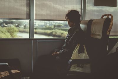 Man sitting in train