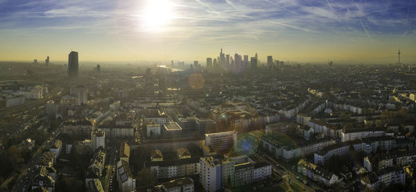 High angle view of city buildings against sky