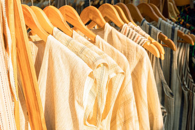 Clothes hanging on rack at store