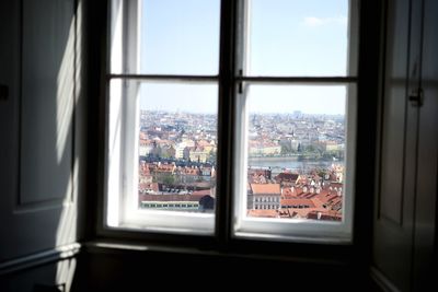 Cityscape seen through window