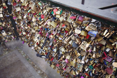 Close-up of padlocks on railing