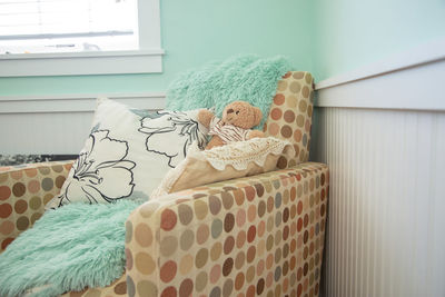 Close-up of stuffed toy on table at home