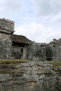 View of old ruin building against cloudy sky