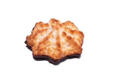 High angle view of bread in plate against white background