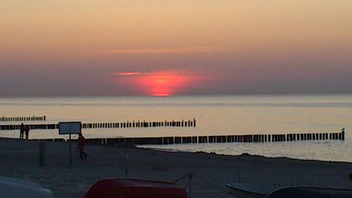 Scenic view of sea at sunset