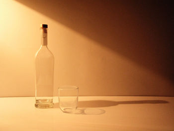 Close-up of wine bottles on table