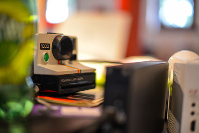 Close-up of camera on table