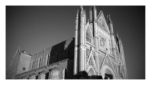 Low angle view of built structure against clear sky