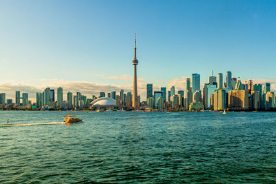 View of buildings in city against clear sky