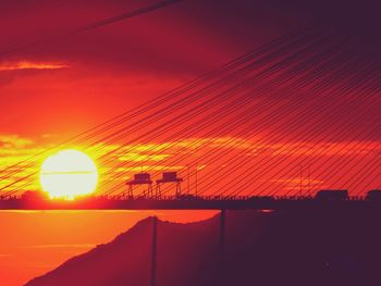 Silhouette of bridge during sunset