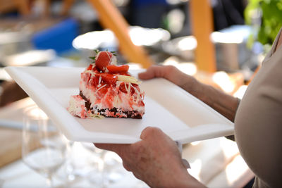 Man holding pastries