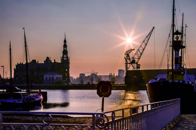 View of harbor at sunset