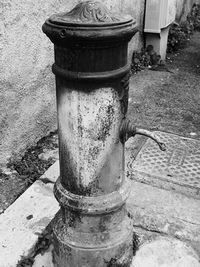 High angle view of fire hydrant on footpath