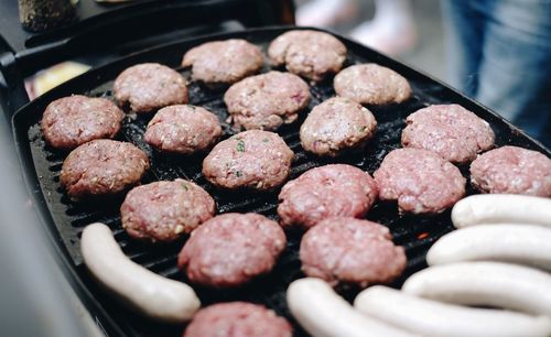 Close-up of meat in barbecue grill