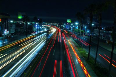 High angle view of light trails on city street