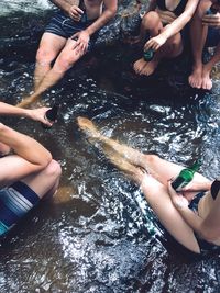 High angle view of boy playing in water