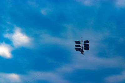 Low angle view of airplane in sky