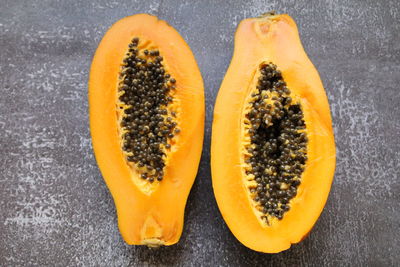 Directly above shot of orange on yellow background