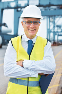 Portrait of engineer standing at dock