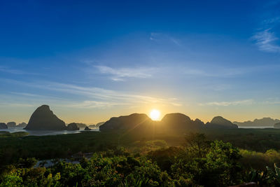 Scenic view of mountains against sky during sunset