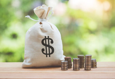 Close-up of coins on table