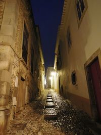 Narrow alley along buildings